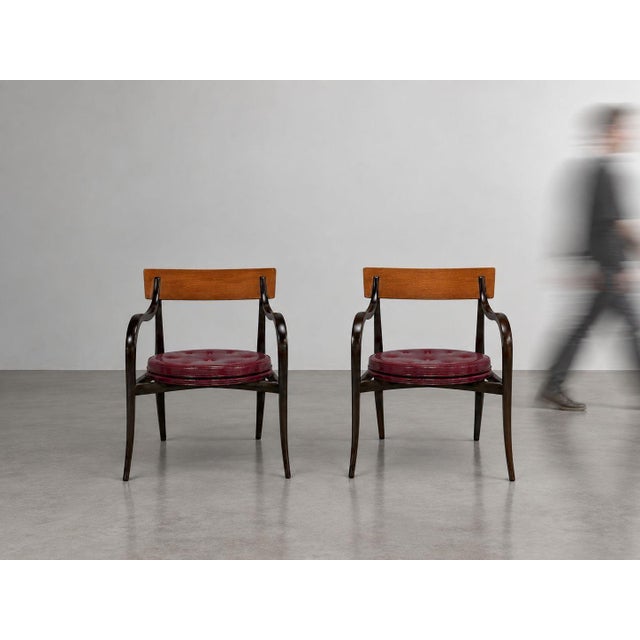 Edward Wormley, Dunbar, Rare “Alexandria” Armchairs, Mahogany, Walnut, Burgundy Vinyl, United States, 1960s A refined pair...