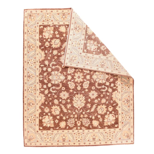 Everything is aggressively barbed or serrated on the abrashed wine field of this well-woven piece. The central octofoils...