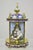 Vintage Chinese Cloisonne Brass Figural Porcelain Enamel Mantel Clock. Item features a cloisonne enamel case, brass frame,...