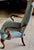 The design of the Louis XV style chair suggests it is intended as a decorative accent piece, offering both comfort and...