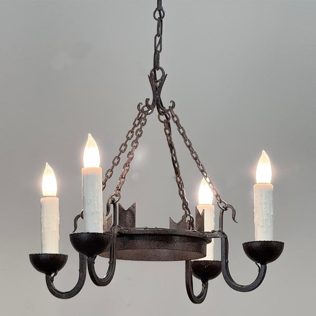 Antique Country French Wrought Iron Chandelier combines a tailored, rustic effect with the durability of wrought iron to...