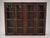 This classic mahogany Georgian colonial executive bookcase with glass doors on cadenza is a sophisticated piece of...