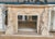A masterful work of sculpture and architecture, this enchanting hand-carved fireplace mantle features a whimsical and...