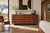 An exquisite vintage walnut dresser designed by the renowned John Kapel for Glenn of California, dating back to the 1950s....
