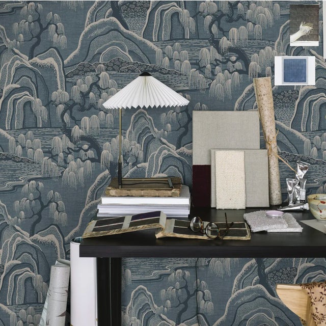 Featuring an enchanting composition of rolling hills, graceful willow trees, and rippling water, Indigo Garden by...