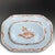 A large Chinese export porcelain dish dating to the Qing Dynasty and 18th century. The dish is hand-painted with...