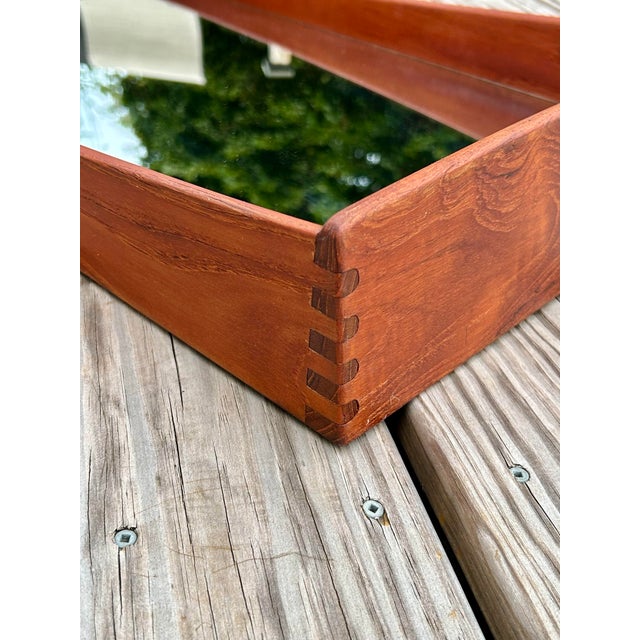 1960's solid teak Danish mirror with shelf. Mirror in style of Aksel Kjersgaard or Jansen - unmarked. Very good condition....