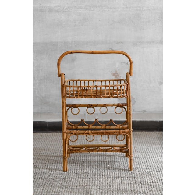 Mid-Century Bamboo Bottle Rack Etagère Product Details with storage shelf and handle. Dimensions: 52 W x 66 H x 28 D cm