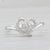 This lovely ring comes with its original inner and outer box. Gemstone Information: - Natural Diamonds - Total Carats -...