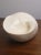 Vintage, likely c. 1980's medium sized ivory color resin, modernist biomorphic nautilus shell bowl. A rare, unique and...