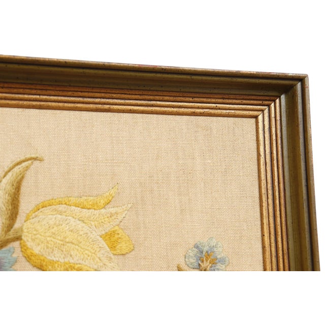 A 1970’s crewel hand embroidered floral still life on linen. Designed by Elsa Williams for Needle Craft, the design...
