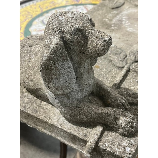 A charming and unusual cast stone garden Bench with Dog. Beautifully crafted with exceptional detail, from the serene...
