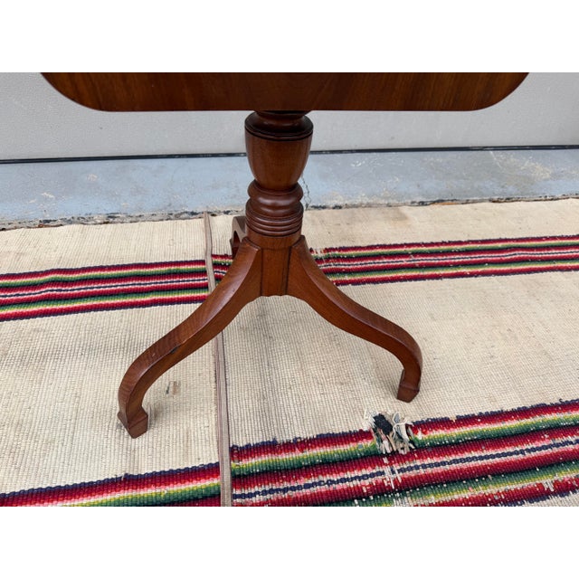 A Antique English Victorian Mahogany Tilt Top Candle Stand, Circa 1850's Made in England, circa 1840-1860's Nicely turned...