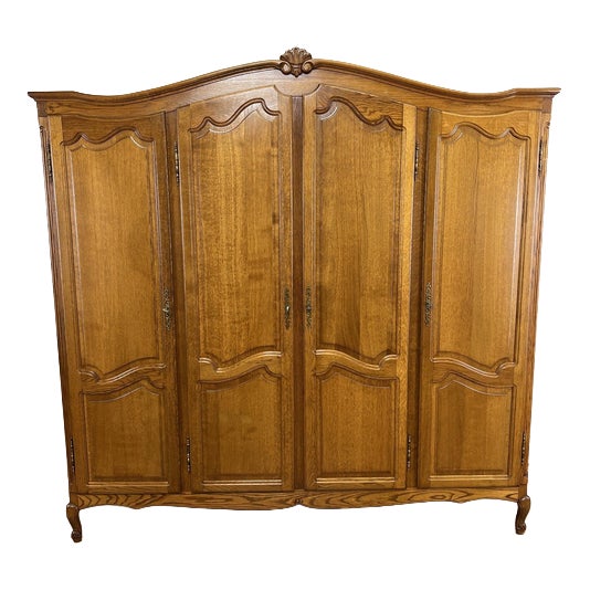 Vintage French Louis XVI Style Carved Oak 4-Door Armoire For Sale