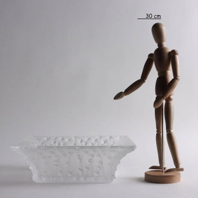 Satin crystal centerpiece with relief rose motifs. Under the brand of the manufacture brand. This piece is attributed to...