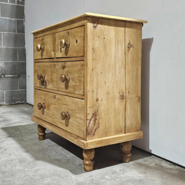 A charming antique English pine dresser with a wonderfully petite footprint—perfectly scaled for a nightstand in a bedroom...