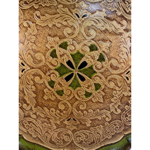 An elegant hand carved and hand painted large 15.25" diameter Italian wooden Florentine Tray. Circa Mid 20th Century. This...