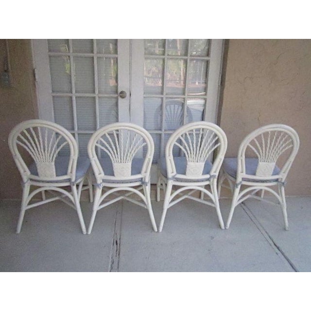 Tropical style wicker bamboo dining chair white with cushion Set of 4 Style: Tropical Color: White Dimensions: 19" W x 36"...