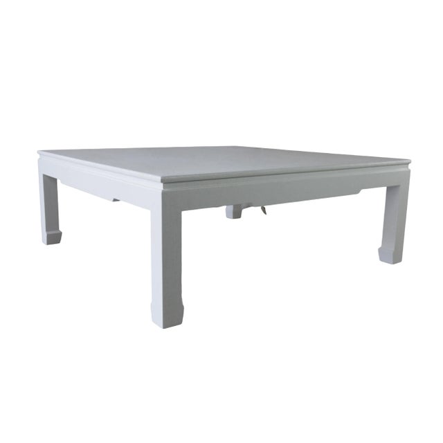 The White Raffia Square Coffee Table is made of textured, painted grass and measures inches, making it ideal for sectional...