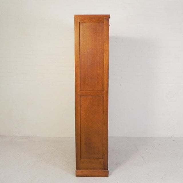 Oak Roller Shutter Cabinet, 1950s, in Good conditions. Designed 1950 to 1959