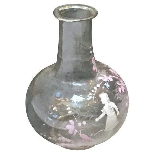 Victorian glass vase enamel painted with a girl in a garden surrounded by flowers by Mary Gregory. Mary Gregory was the...