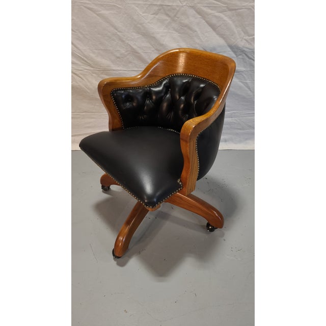 This is a gorgeous vintage leather and oak task/office chair. The leather is in perfect condition, minor scuffs on base....