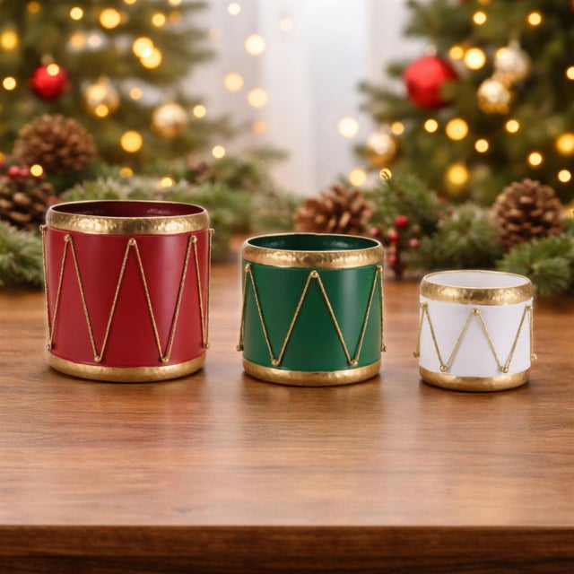 Strike up some festive style with this Metal Drum Containers with Gold Rope Detail (Set of 3). Inspired by classic holiday...