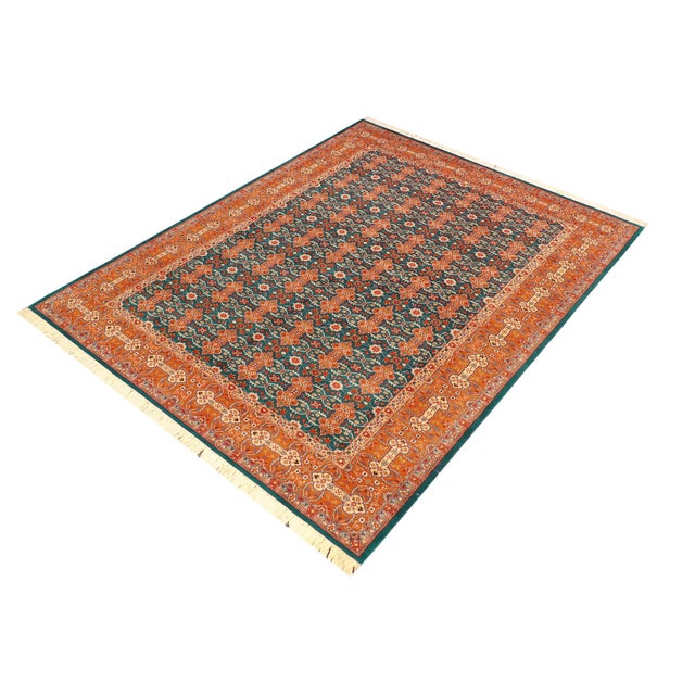 Designed with mesmerizing intricacy and gorgeous color palette, this hand-knotted masterpiece demonstrates the beauty and...