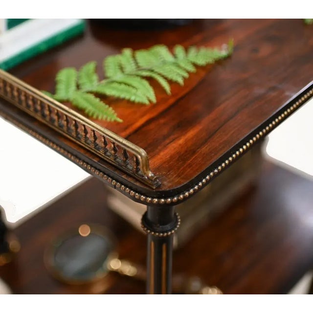 Victorian rosewood high quality. Whatnot surmounted with a brass gallery with string inlaid supporting columns. Great...