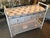The most amazing custom, changing table! Newly lacquered in a white gloss finish, drawer with dividers, ceramic elephant...
