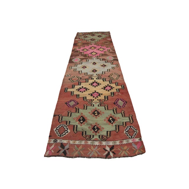 Vintage handwoven decorative kilim rug from Kars region of Turkey. Approximately 50-60 years old. In very good condition.