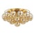 Gorgeous champagne glass globes are clustered around an elegant Aged Brass frame to create a statement piece that is...