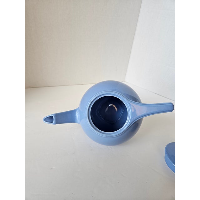 This particular style of Hall's teapot was designed for a World's Fair. It is very angular and was a modern concept at the...