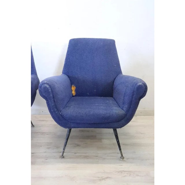 Lovely italian design pair of armchairs in original used conditions 1950s. In original iron legs and brass feet with...