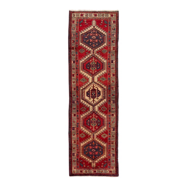 Vintage Hand-Knotted Turkish Wool Runner Rug With Geometric Tribal Medallions in Crimson, Indigo, and Cream For Sale