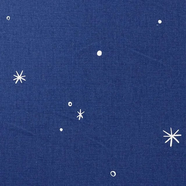Calisto is a dreamy star pattern with a captivating, hand-drawn look. Charming and graphic, it adds poetry to any room....