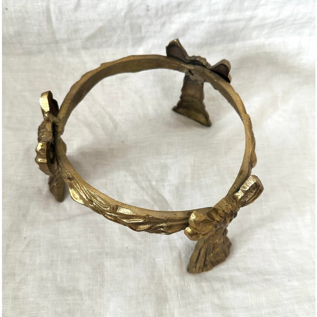 Vintage Brass Ribbon Bowl Display or Plant Holder. Perfect for the holiday with a red bowl which will make the brass stand...