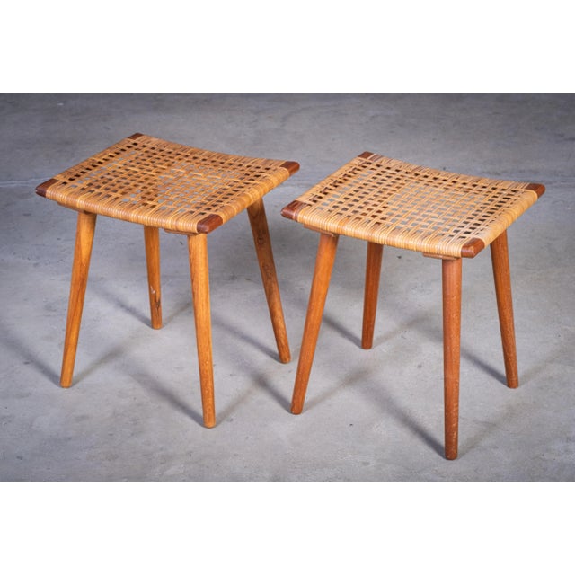 Elegant pair of stools from the 1960s, crafted in solid teak with cane seats. A classic example of Danish mid-century...