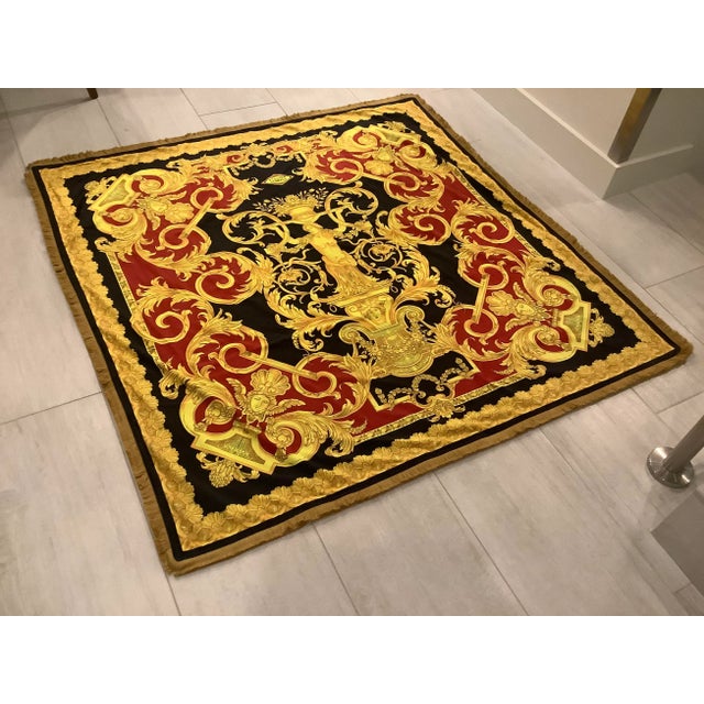 Vintage custom made large atelier Versace velvet throw 55”55” with gold fringe red gold print. With good fridge please...