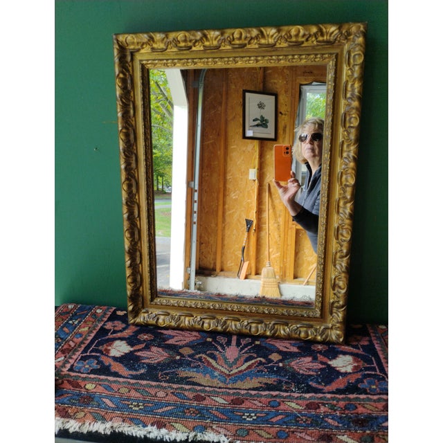 Antique Handcarved Giltwood Mirror. An early piece with substance and style. purchased at a high end shop in Concord MA....