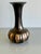This small vintage vase is made of brass and copper. It doesn't have any markings so I am not sure when it dates back to....