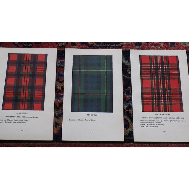 This vintage mid 20th centuey set of fifteen (15) lithographs (offset) depict Scottish tartan plaids. On the verso...