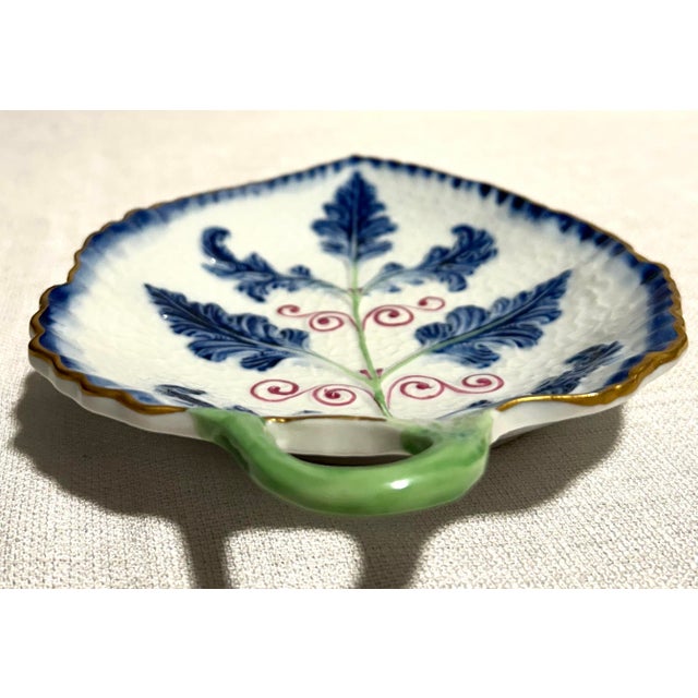 Refined and sculptural in form, this MCM Italian Sèvres hand-painted porcelain leaf catchall brings together elegant mid-...