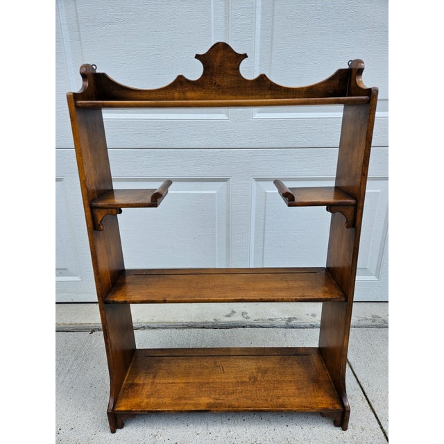 This unique three four shelf floor or wall mount etagere or shelf features two smaller Chippendale style upper shelfs and...