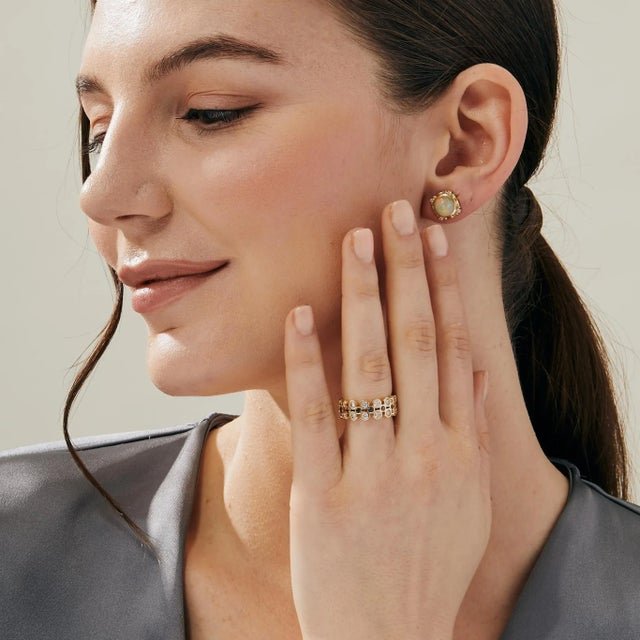 Created in 18 karat yellow gold Black diamonds 0.35 carat approx. Diamonds 1.20 carats approx. Rings size US 6.5 Crafted...