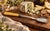 A handsome antique English Stilton scoop with a broad, shallow electroplated blade engraved with a delicate floral motif....