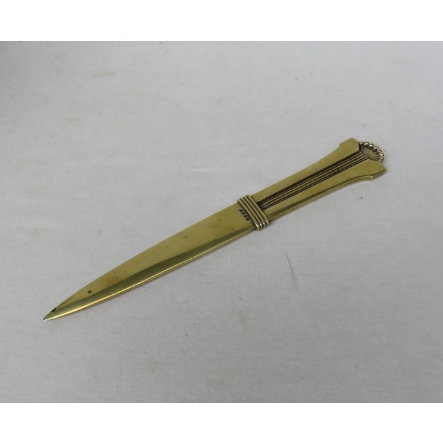 Letter opener, Art Nouveau, Brass with ornaments in the early, strict Nouveau The incorporated ornaments were black...