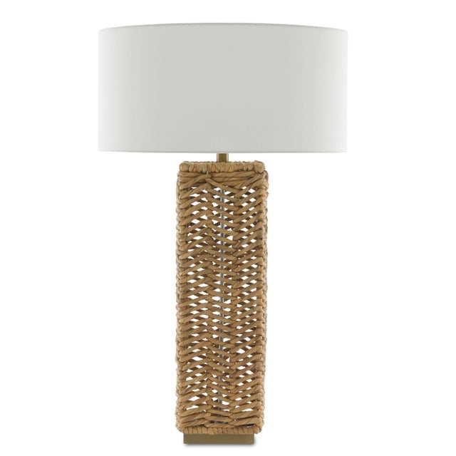 Our Torquay Table Lamp is one of our creations that illustrates the skill of our artisans who weave natural materials. The...