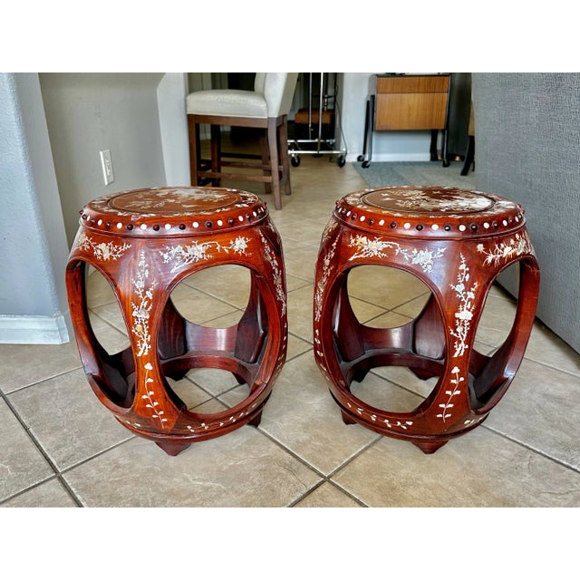 Pair of matching Chinese Asian carved beautiful rosewood barrel or garden stools covered in expertly crafted mother of...