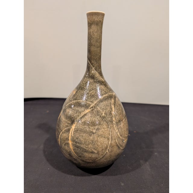 Signed porcelain vase by American ceramic artist Suzanne Hill, created in the mid-2000s and confirmed by the artist as her...